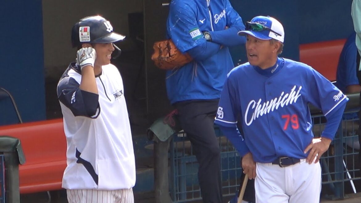 過去にジャイアンツで一緒だった北村に挨拶される大西コーチ (2024/02/18)