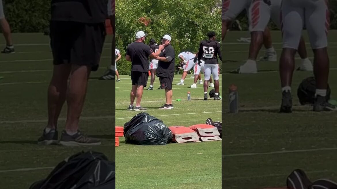 Trey Hendrickson stretches, Darrin Simmons chats up Lucas Patrick Thursday at Bengals practice